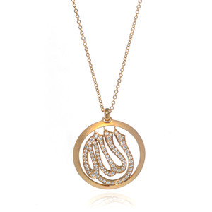 An image of a new Luca Carati women's necklace with diamonds, featuring a yellow gold pendant with an Arabic symbol design encrusted with sparkling round diamonds, displayed frontally and centered against a white background. The delicate yellow gold chain is partially visible, extending upwards from the pendant, and is shown at a medium distance, providing a clear view of the jewelry's details. The angle of the shot is direct and level with the pendant, ensuring the design and diamonds are in full focus.