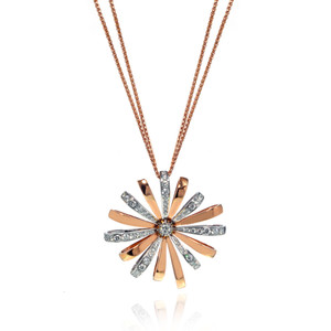 An image of a new Luca Carati women's necklace with diamonds, featuring a rose gold pendant with a floral design, alternating between smooth rose gold petals with diamond-encrusted white gold petals, centered with a circular cluster of diamonds. The pendant is suspended from a double rose gold chain, presented in a head-on view against a white background, with the chain partially visible and the pendant prominently displayed in the foreground. The photo is taken from a front angle with the necklace appearing close-up to showcase its details.