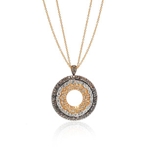 An image of a new Luca Carati women's pendant necklace with diamonds, featuring a circular pendant with concentric circles of brown and white round cut diamonds set in yellow gold with chain. The pendant is centered and viewed frontally at a close distance, showcasing the intricate design and sparkling stones against a white background with a subtle reflection below.