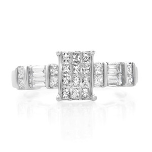 An image of a Rachel Koen women's engagement ring with diamonds, displayed frontally at a direct angle. The ring features a prominent princess cut diamonds in the center  with baguettes and princess cut diamonds on the ring shoulders, all mounted on a polished white gold band. The image is a close-up, showcasing the ring's intricate design and the diamonds' brilliance against a white background. The ring is preowned in a great condition. 