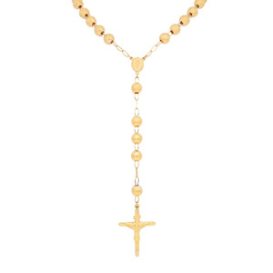 An image of a Rachel Koen brand unisex adult cross rosary lariat necklace without stones, displayed against a white background. The necklace features spherical yellow gold beads of varying sizes linked together, with the largest beads positioned at regular intervals. A central feature bead with an embossed design is connected to a vertical string of smaller beads leading to a yellow gold crucifix pendant at the bottom. The necklace is shown in a straight-on view with the crucifix centered and the chain extending upwards at equal angles to the top corners of the frame, suggesting a symmetrical and frontal perspective. The distance from the camera provides a complete view of the necklace, allowing for the details of each bead and the pendant to be clearly visible.The necklace is pre owned in a great condition. 