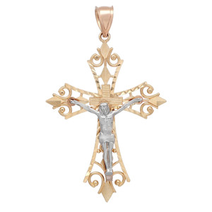 Front view of the two tone crucifix filigree cross pendant in yellow gold with jesus in the center in white gold without chain