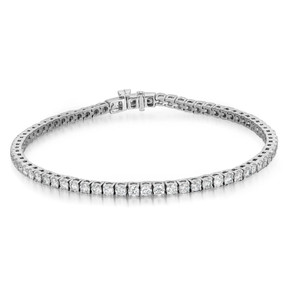 An image of a Rachel Koen unisex adult bracelet with lab grown diamonds, positioned centrally and photographed from a top-down angle. The bracelet forms a complete circle and is displayed against a white background, emphasizing its luster and sparkle. The lab grown diamonds are set in a uniform, continuous line around the band, and the clasp is visible at the top, indicating the bracelet's opening mechanism. The view is from a medium distance, allowing for a clear view of the entire bracelet and its intricate details.