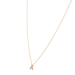 An image of a Rachel Koen brand necklace designed for women, displayed against a white background. The necklace has a delicate rose gold chain without stones, and features a single pendant in the shape of the letter "A" hanging at the center. The pendant is positioned in the lower third of the frame, with the chain extending up and out towards the upper corners of the image, creating a V-shape. The piece is captured from a frontal angle and appears to be at a medium distance from the viewer, allowing for a clear view of its simple and elegant design.