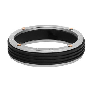 An image of a men's ring without stones, designed by Baraka, positioned horizontally. The ring features a white gold band with black PVD in center with subtle grooves and small, round rose gold accents. The angle is slightly tilted, showing the circular shape and the intricate detailing, captured from a close distance to highlight its texture and craftsmanship.