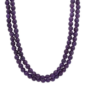 An image of a women's necklace by Rachel Koen, featuring two strands of round purple amethyst beads. The necklace is positioned vertically, with a slight curve at the bottom, captured from a front angle and close distance, emphasizing the round shape and luster of each gemstone.Excellent pre-owned condition. 