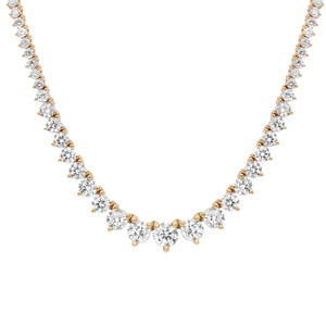 An image of a women's necklace by Rachel Koen featuring a series of round lab grown diamonds set in a graduation pattern. The necklace is displayed against a plain white background, captured from a front-facing angle at a close distance, highlighting the brilliance and clarity of the diamonds in yellow gold. Each diamond is held in place by gold prongs, with larger diamonds positioned centrally and gradually decreasing in size towards the edges, creating an elegant and balanced design.