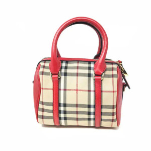 An image of Burberry Alchester Beige Red Small Ladies Handbag.This bag features a signature check print bowler with Equestrian Knight details. Comes in gold-tone hardware with an adjustable and detachable crossbody leather shoulder strap with a top zip closure one interior zip pocket and one slip pocket. Interior fabric lining. Made in Italy. Store display model. Might show a little creasing, scratches, and metal discoloration on the bottom leather and bottom studs due to storing and handling. The original box and dust bag are not included. 