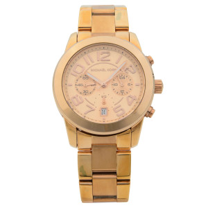 An image of a Wristwatch by Michael Kors. This Pre Owned item is designed for Women, featuring a Classic style. It has a Quartz movement and an Analog display with a Salmon dial color. The indices include 12-Hour Dial,Arabic Numerals,Multi Dial,Seconds Hand. The band is made of Stainless Steel and the case is made of Stainless Steel. The watch has a Round shape with a case size of 42 mm and a case thickness of 12 mm.