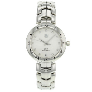 An image of a Wristwatch by TAG Heuer. This Pre Owned item is designed for Women, featuring a Dress/Formal style. It has a Mechanical (Automatic) movement and an Analog display with a Silver dial color. The indices include 12-Hour Dial,Diamond Markers. The band is made of Stainless Steel and the case is made of Stainless Steel. The watch has a Round shape with a case size of 34 mm and a case thickness of 10 mm.