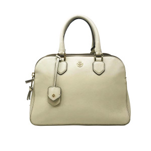 This image showcases a cream-colored Tory Burch Robinson Pebbled Triple-Zip Satchel Women's Bag in an upright position, viewed from the front at a close distance. The bag features two short handles, a central zipper, and a small emblem on the front, with the leather texture and stitching details clearly visible. A decorative tag is seen hanging from one of the handles. This bag is in excellent pre-owned condition, having never been worn. Any minor imperfections are due to storage. It comes with a shoulder strap, but the dust bag is not included.