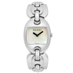 An image of a pre-owned women's Gucci  121 Marina Chain Stainless Steel 26MM Quartz wristwatch positioned vertically and centered. The watch is viewed from the front at a close distance, showcasing its silver-tone, oval-shaped case. The dial features a mother-of-pearl face with black hour and minute hands, along with the "Gucci" logo at the top. The bracelet consists of large, polished links, adding to its elegant design.