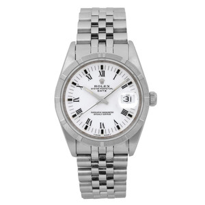 An image of a pre-owned Rolex Date 34mm Engine Turned Steel White Dial Automatic Unisex Watch 15210 for unisex adults, taken from a straight-on angle at a close distance. The watch features a stainless steel metal band, a white dial with Roman numeral hour markers, and luminous hands. It includes a date indicator at the 3 o'clock position.