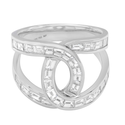 An image of a Rachel Koen brand women's ring with diamonds, showcased in a close-up view against a white background. The ring features a unique double band design with a central circular element, all encrusted with baguette cut diamonds in white gold. The ring is positioned upright, with the bands parallel to the bottom edge of the image, allowing for a clear view of the diamond settings and the hallmark inscribed inside the band. The perspective is head-on, with the camera focused on the front and center of the ring, capturing the intricate details and the reflective quality of the precious metal and gemstones.
