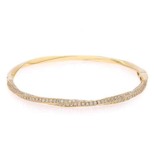 An image of a Rachel Koen women's bracelet with diamonds, displayed in a close-up front view on a neutral background. The bracelet is made in yellow gold with a row of sparkling round cut diamonds set along the top half, shown at a slight angle that highlights the gem's brilliance and the polished gold finish. The bracelet's curvature suggests elegance and sophistication.