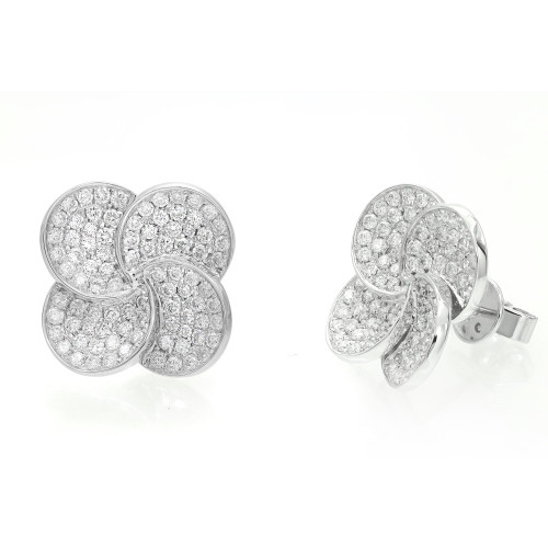 An image of a pair of Rachel Koen women's earrings with diamonds, presented on a white background. These floral earrings are studded with multiple round cut sparkling diamonds in white gold. The left earring is shown front-facing, while the right earring is angled to display the side and back, with a visible post for piercing. They are positioned close to each other, with a slight distance that allows for a clear view of their design and facets.