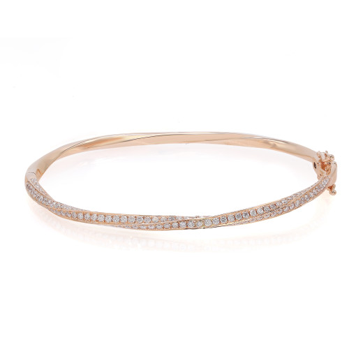 An image of a Rachel Koen women's bracelet with diamonds. The bracelet is positioned horizontally in the center of the frame with a close-up view, showcasing its intricate design. It features a rose gold band with a twisted row of sparkling round cut diamonds set along the top half, catching the light at various angles to emphasize the gems' brilliance. The background is a clean, white surface that contrasts with the warm tones of the metal and the clear, bright diamonds.