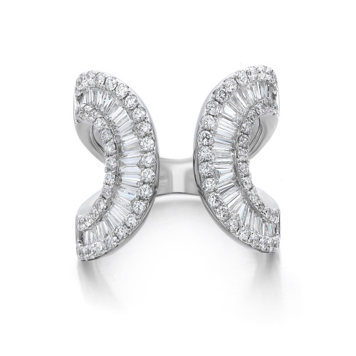 An image of a Rachel Koen women's ring with diamonds displayed front and center on a white background. The ring features a unique open design with two curved bands adorned with multiple round and baguette-cut diamonds, creating a sparkling effect in white gold. The bands are angled slightly toward the viewer, showcasing the diamonds' brilliance and the ring's intricate detail. The distance from the viewer is close enough to capture the reflective qualities of the diamonds and the polished metal setting.
