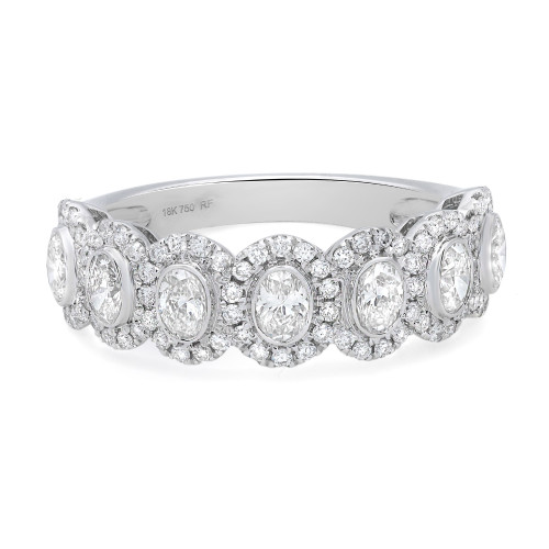 An image of a Rachel Koen women's ring with diamonds, displayed in a close-up, frontal view. The ring features a series of round-cut diamonds encircled by halos of smaller diamonds, set in a polished 18K white gold band. The design is intricate and the diamonds catch the light at various angles, suggesting brilliance and luxury.