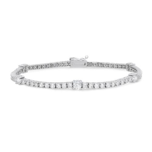 An image of a Rachel Koen unisex adult bracelet with diamonds. The bracelet is presented in a straight, horizontal position against a white background. It is viewed from a top-down angle, showcasing its intricate design with round cut diamonds encrusted throughout its length in white gold. The bracelet includes a secure clasp and is photographed from a close, but not macro distance, allowing clear visibility of the diamonds and the overall design.