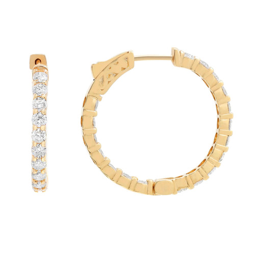 An image of a pair of Rachel Koen brand earrings designed for women, featuring diamonds. The earrings are displayed against a white background. On the left, one earring is shown in a side view, revealing a row of sparkling round cut diamonds set in yellow gold. The right shows the other earring in a front-facing position, forming a complete hoop with diamonds encircling the outer and inner edge. The earrings are positioned close to the camera, providing a clear and detailed view of their elegant design and luxurious gems.