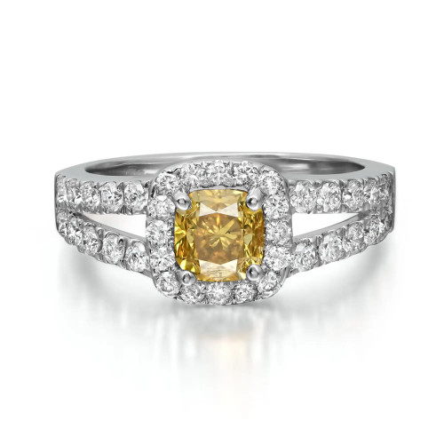 An image of a Rachel Koen women's cocktail ring with diamonds, showcasing a central cushion-cut yellow diamond in a four-prong setting, flanked by a halo of smaller round-cut white diamonds on white gold, viewed from a front angle at close distance against a white background.