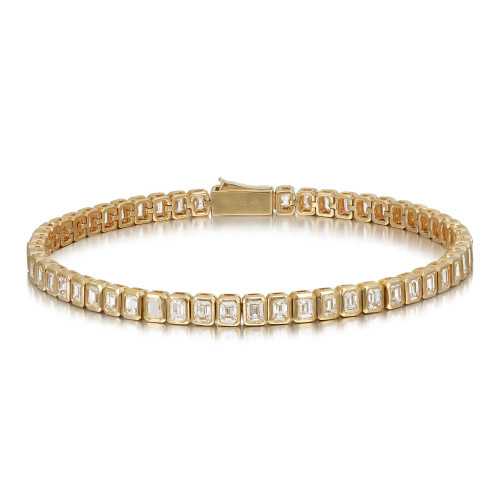An image of a Rachel Koen unisex adult tennis bracelet with diamonds, positioned front and center against a white background. The bracelet is displayed at a slight angle, showcasing its full circle with a visible clasp at the top. The emerald cut  diamonds are set in a bezel setting that wraps around the entirety of the bracelet, glistening against the yellow gold setting. The piece is photographed from a medium distance, allowing clear visibility of the diamonds' cut and the bracelet's design.
