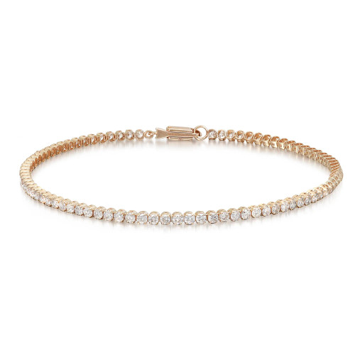 An image of a Rachel Koen unisex adult tennis bracelet with diamonds. The bracelet is positioned centrally and horizontally against a white background. It features a full view showing a row of sparkling round cut diamonds set in yellow gold, capturing the light at various angles to emphasize their brilliance. The clasp of the bracelet is visible on the left side, and the entire piece is in sharp focus, allowing for detailed observation from a medium distance.