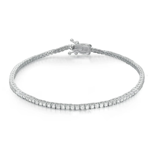 An image of a Rachel Koen unisex adult tennis bracelet with prong set round cut diamonds, displayed against a white background. The bracelet is positioned in a slight curve with the clasp partially open and oriented towards the top right corner. The diamonds are set in a continuous line around the white gold bracelet, catching the light to showcase their brilliance. The photograph is taken from a top-down angle at a close distance, providing a clear view of the individual diamond settings and the overall design of the piece.