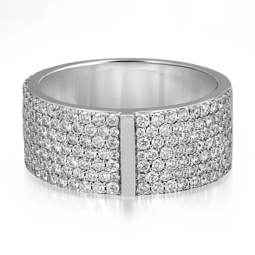 An image of a luxurious Messika brand Kate Pavee women's wide band ring with diamonds, viewed from a front angle that showcases the ring's full circumference. The ring features a wide band densely encrusted with numerous small, sparkling diamonds set in a pattern that covers the entire visible surface. The band has a smooth, polished 18k white gold finish with a slight gap at the center, creating a modern and elegant design.