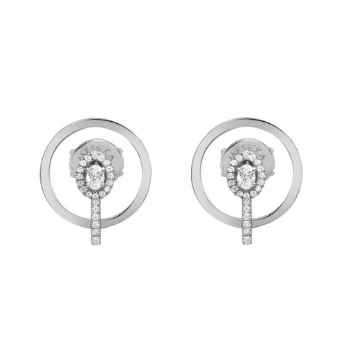 An image of a pair of Messika women's Glam'Azone Graphic 18k white gold earrings with diamonds. The earrings are shown front-facing against a white background, positioned horizontally with a slight distance between them. Each earring features a circular outer ring with the brand name engraved at the top, encircling a floral diamond cluster with a diamond-studded drop extending downwards. The design is symmetrical, elegant, and crafted to reflect light beautifully.