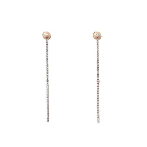 An image of a pair of Messika women's Barrettes Gatsby earrings with diamonds. Displayed on a white background, two vertical, slender, rose gold bar earrings with a series of small, round, prong-set diamonds sparkle along their length. At the top of each earring is a larger, bezel-set diamond. The earrings are positioned parallel to each other and captured from a front-facing angle, showing the full design and length clearly, with a medium-close distance providing detail and context.