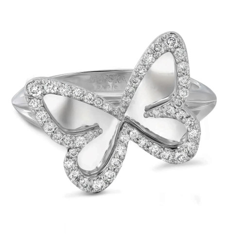 An image of a Messika women's Plaque Butterfly ring with diamonds, showcasing an intricate, looping bow design. The ring is viewed from a top-down angle, positioned centrally against a white background. The bow motif is encrusted with numerous sparkling diamonds, set against a polished white gold band which is visible at a medium distance, providing a clear view of the ring's design and the brand's engraving inside the band.