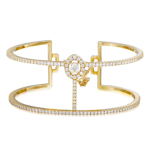 An image of a Messika women's Glam'Azone 2 row bracelet with diamonds displayed against a white background. The bracelet features a double-band design in 18k yellow gold, encrusted with multiple small diamonds along its circumference. A larger, circular diamond centerpiece connects the two bands, with a halo of smaller diamonds around it. The bracelet is positioned centrally and photographed from a top-down angle, showcasing the full design and sparkle of the diamonds. The image is taken from a close but sufficient distance to capture the entire bracelet clearly.
