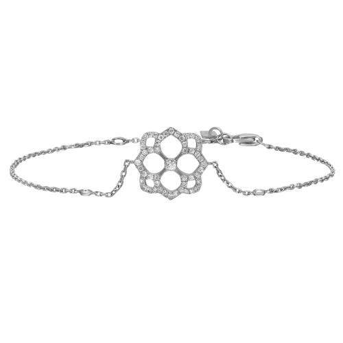 An image of a Messika women's Eden chain 18k white gold bracelet with diamonds, displayed in a straight horizontal position. The central decorative element, showcasing a flower-like pattern encrusted with diamonds, is centered and in focus. The delicate chain with evenly spaced diamond accents extends from both sides of the central motif. The bracelet is photographed from above at a close distance, providing a clear, unobstructed view of the intricate design and sparkling diamonds.