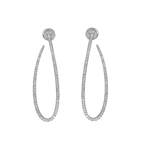 An image of a pair of Messika women's Gatsby Ovales 18k white gold earrings with diamonds, displayed against a white background. The earrings are positioned vertically and symmetrically, with a moderate distance between them, allowing a clear view of their elongated teardrop shape. Each earring features a row of small, round-cut diamonds set along its entire length, providing a sparkling appearance from all angles. The top of each earring has a circular stud encrusted with diamonds, designed to attach to the earlobe.