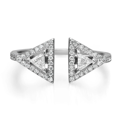 An image of a Messika brand women's Thea 18k white gold ring with diamonds. The ring features a unique open band design with two large, triangular diamonds facing each other. Smaller diamonds encrust the band and the triangle settings, enhancing the sparkle. The photo is taken at a close distance, with a direct frontal view, showcasing the ring's details and the diamonds' clarity. The ring is centered in the frame against a white background, emphasizing its design and elegance.