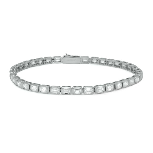 An image of a Rachel Koen unisex adult tennis bracelet with bezel set emerald cut diamonds in white gold, displayed in full view on a neutral background. The bracelet is laid out in a straight line, angled slightly from the top left to the bottom right of the frame, showcasing its entirety. The diamonds are set in a consistent pattern around the bracelet, and the clasp is visible on the left side, marked with "18K 750 RF" indicating the metal purity. The image is taken from a close distance, ensuring the details of the diamonds and the setting are clearly visible.