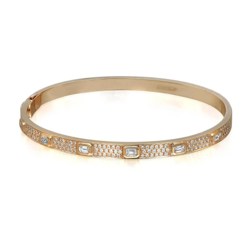 An image of a Rachel Koen women's bangle bracelet with round and emerald diamonds in yellow gold, displayed in a straight-on view against a white background. The bracelet is positioned horizontally across the center of the frame, showcasing its full design with a slight angle that gives a three-dimensional perspective. The distance is close enough to highlight the bracelet's details, featuring a golden band encrusted with multiple small round diamonds and several larger, rectangular diamonds evenly spaced along its length.