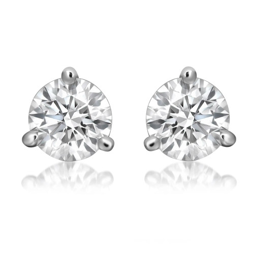 An image of a pair of Rachel Koen branded unisex adult stud earrings with lab grown diamonds, displayed frontally at a close distance. The earrings feature large, round-cut diamonds set in a simple three prong setting in white gold that allows maximum light to enter the stones, enhancing their brilliance. The diamonds' facets are clearly visible, reflecting light at various angles to showcase their cut and clarity. The background is plain white, emphasizing the earrings' sparkle and design.
