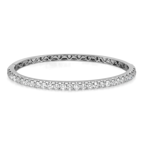An image of a Rachel Koen women's bracelet with diamonds, showcased on a neutral background. The bracelet is positioned horizontally in the center of the frame, offering a clear view of its design. The camera angle is directly above the bracelet, providing a detailed top-down perspective that highlights the brilliance of the prong set round cut diamonds set around the circumference. The distance between the camera and the bracelet is close enough to show the sparkling diamonds and the intricate details of the metalwork with high clarity.