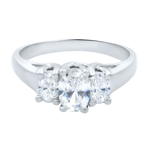An image of a women's Rachel Koen brand engagement ring with diamonds, displayed in a close-up front view. The ring features a polished white gold band with a trio of prominent oval-cut diamonds set in line across the top center, the middle stone slightly larger than the flanking ones. The diamonds are held in place by shared prongs, and the ring is positioned against a white background, highlighting its brilliance and detail.