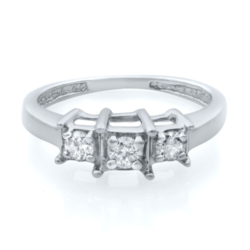 An image of a women's Rachel Koen brand engagement ring with three stone diamonds, showcased in a close-up frontal view against a white background. The ring features a polished 14k white gold band with a series of diamonds set in a line at the center, with the largest diamond in the middle flanked by smaller diamonds on each side. The band has additional smaller diamonds embedded along its shoulders, which taper slightly as they approach the setting. The overall composition highlights the ring's sparkle and intricate design.