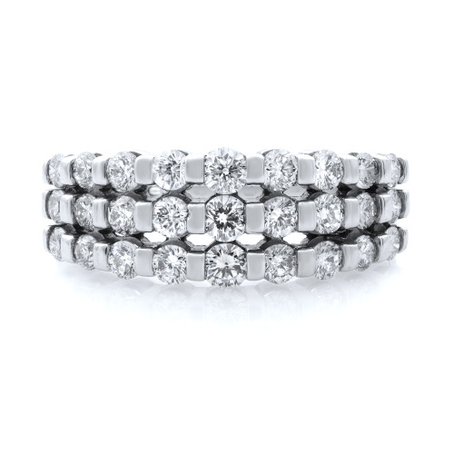 An image of a Rachel Koen brand women's wedding band with diamonds, displayed frontally. The ring features three rows of round diamonds set in a 14k white gold band, with the focus on the topmost part of the ring showing a close-up view. The diamonds are positioned closely together, creating a continuous, sparkling surface. The image is taken from a straight-on angle at a close distance, showcasing the intricate design and the reflective quality of the diamonds and the metal setting.