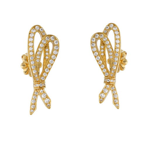 An image of a pair of Tiffany & Co. women's earrings with diamonds. Displayed frontally against a white background, the earrings are symmetrical and positioned side by side. Each earring is crafted in a yellow gold, featuring a looped, ribbon-like design encrusted with multiple pave set round-cut diamonds, offering a sparkling appearance. The view is head-on, ensuring the earrings' intricate details and their luxurious finish are clearly visible from a medium distance.