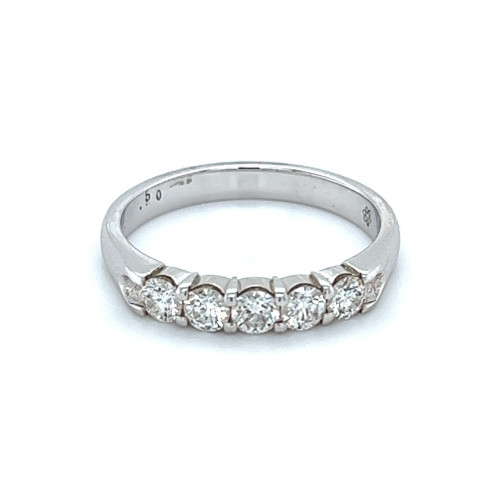 An image of a Rachel Koen women's wedding ring with diamonds, displayed frontally at a direct angle and close distance, showcasing multiple round-cut diamonds set in a polished white gold band with clear visibility of the gemstones and the ring's design.The ring is pre owned in a great condition.