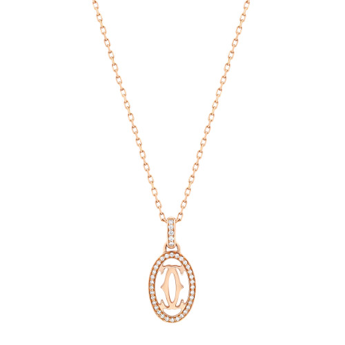 An image of a Cartier Double C De Cartier women's necklace with diamonds, displayed against a white background. The necklace features a rose gold chain viewed from a front, straight-on angle, with the pendant centrally positioned at a close distance. The pendant is oval with an intricate cut-out design, encircled by a halo of small, sparkling diamonds. Comes in a great preowned condition.