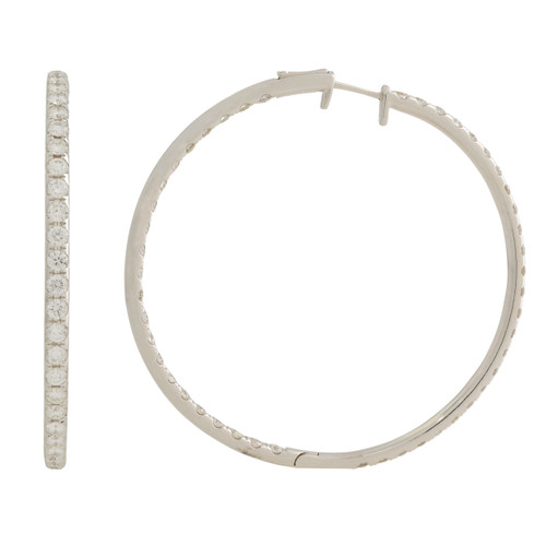 An image of a Rachel Koen brand women's medium hoop earring with inside out diamonds set in a white gold, displayed against a white background. The earring is shown in two different angles: one side view on the left, highlighting a row of diamonds set along the earring's outer edge, and a frontal view on the right showing the hoop's circular shape and the latch mechanism. The earring appears to be a medium hoop design, and the diamonds are visible along the forward-facing side, suggesting a luxurious and sparkling appearance. The distance between the earring views suggests a close-up perspective to emphasize detail.