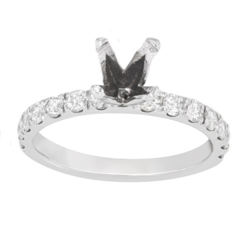 An image of a Rachel Koen brand white gold engagement ring mounting for women, featuring a central diamond setting in a close front view with a slight elevation angle. The ring's band is encrusted with smaller diamonds around its circumference, and the overall image is at a medium distance, providing clear detail of the ring's design and gemstone sparkle.