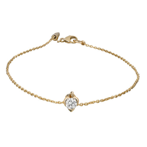 An image of a PANDORA bracelet for women, featuring a delicate gold chain with a heart-shaped diamond centerpiece in yellow gold. The bracelet is laid flat, captured from a slightly elevated angle, showcasing its elegant design. The clasp is visible on the left side, and the diamond is prominently positioned in the center of the image. The photo is taken at close range to highlight the intricate details of the jewelry.